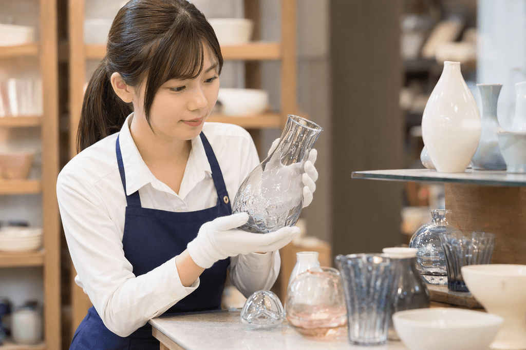 扱う