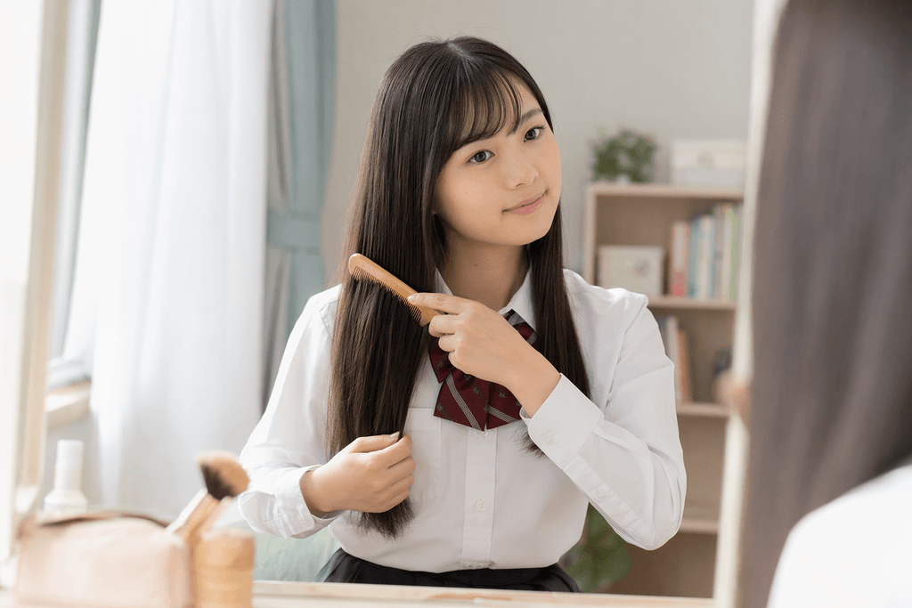 髪